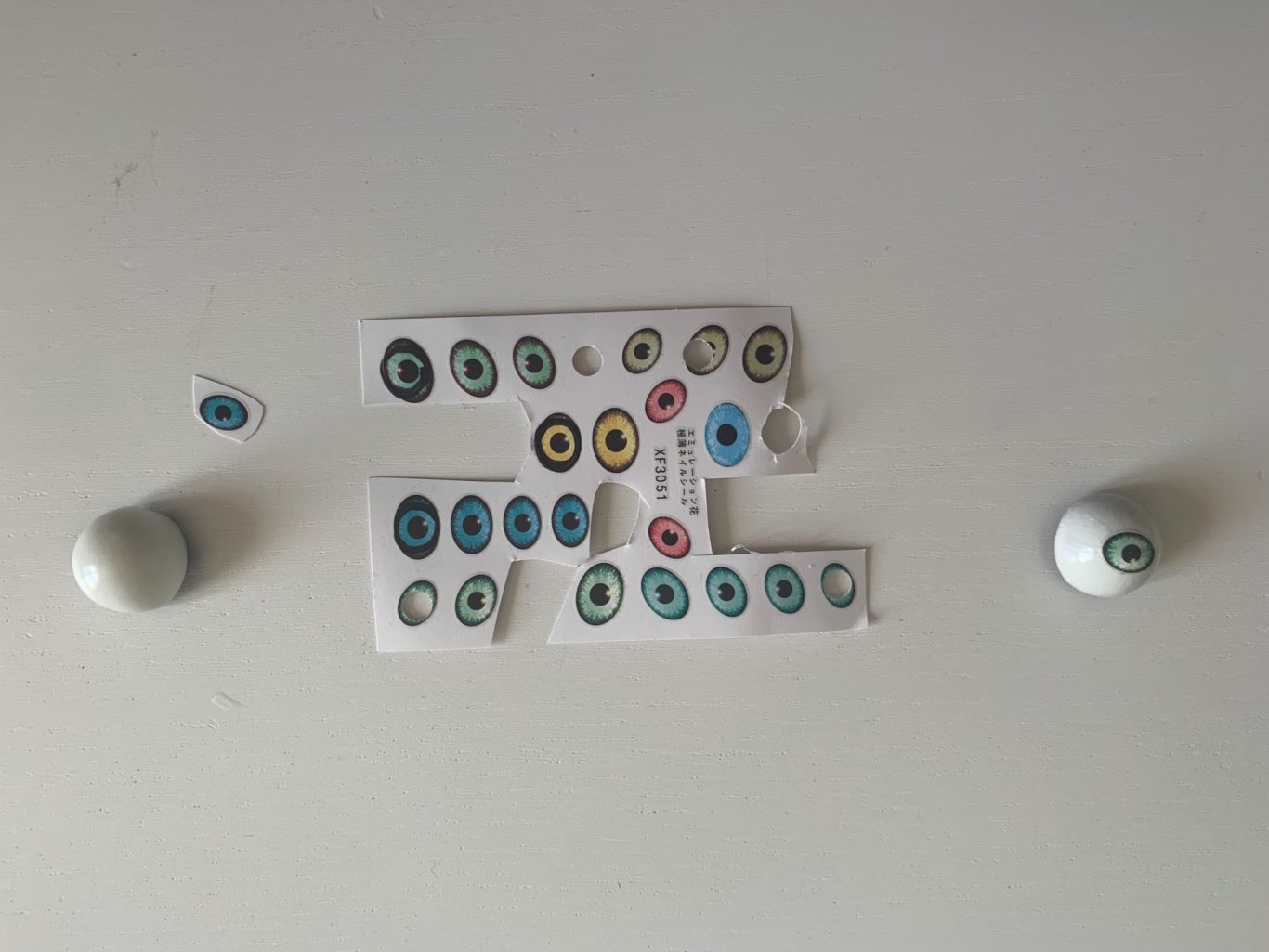 Nail transfer stickers used to make eye pupil